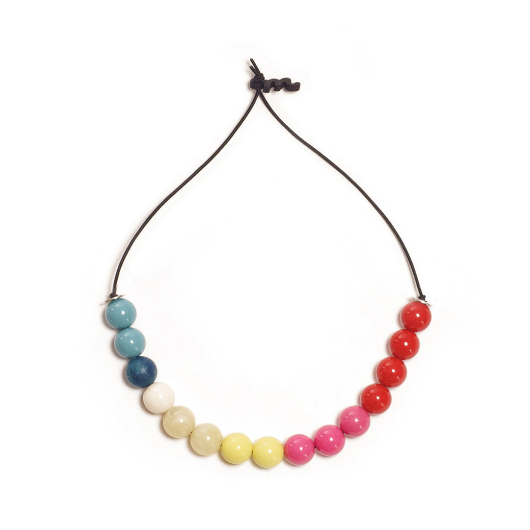 Choker elástico de cuentas multicolor, liviano, cómodo, versátil y atemporal. Diseño conceptual latinoamericano unisex.