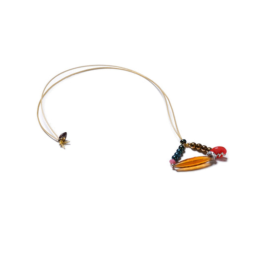 Collar elástico de cuentas multicolor, ajustable, liviano, cómodo, versátil y atemporal. Diseño conceptual latinoamericano. Escala micro.