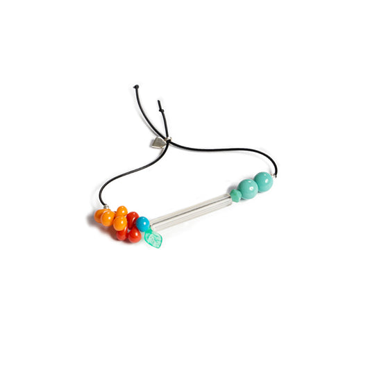 Pulsera multicolor elástica, liviana, cómoda, versátil y atemporal. Diseño conceptual latinoamericano. Escala micro.