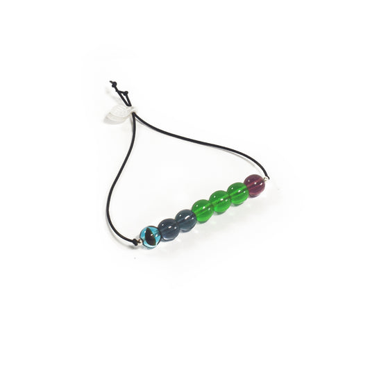 Pulsera multicolor elástica, liviana, cómoda, versátil y atemporal. Diseño conceptual latinoamericano. Escala micro.
