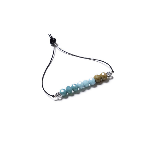 Pulsera multicolor elástica, ajustable, liviana, cómoda, versátil y atemporal. Diseño conceptual latinoamericano. Escala micro.