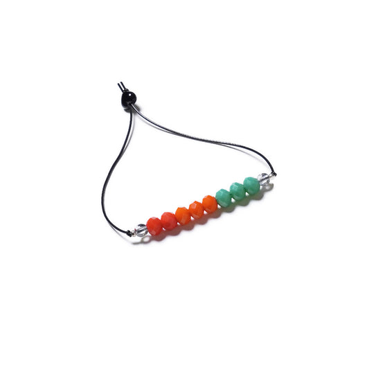 Pulsera multicolor elástica, ajustable, liviana, cómoda, versátil y atemporal. Diseño conceptual latinoamericano. Escala micro.