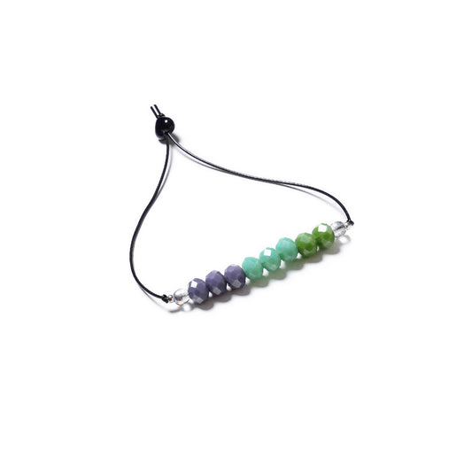 Pulsera multicolor elástica, ajustable, liviana, cómoda, versátil y atemporal. Diseño conceptual latinoamericano. Escala micro.