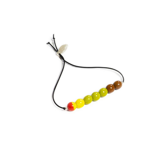 Pulsera multicolor elástica, liviana, cómoda, versátil y atemporal. Diseño conceptual latinoamericano. Escala micro.