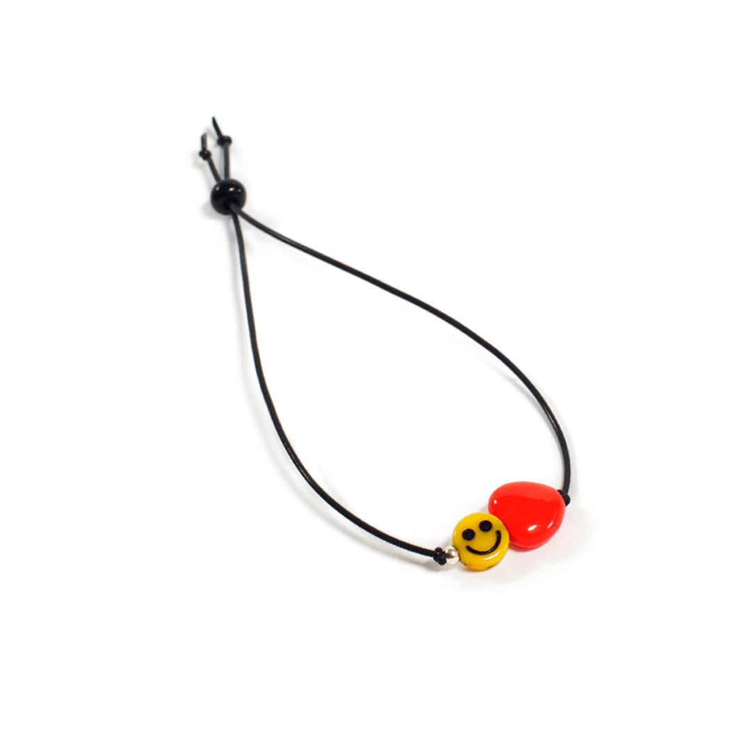 Pulsera multicolor elástica, liviana, cómoda, versátil y atemporal. Diseño conceptual latinoamericano. Escala micro.