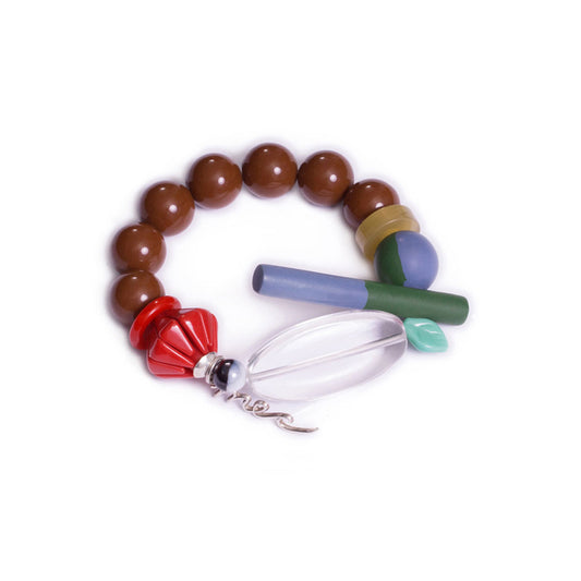 Pulsera multicolor elástica, liviana, cómoda, versátil y atemporal. Diseño conceptual latinoamericano. Escala macro.