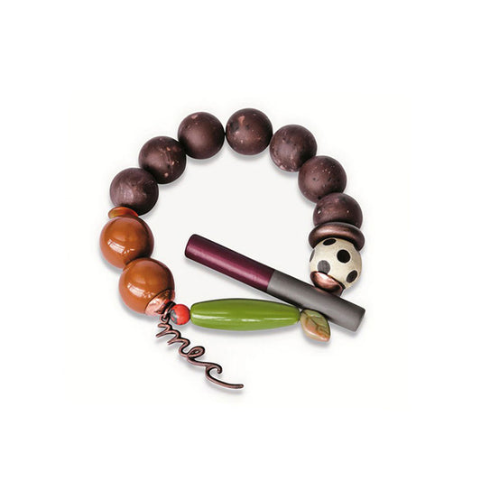 Pulsera multicolor elástica, liviana, cómoda, versátil y atemporal. Diseño conceptual latinoamericano. Escala macro.
