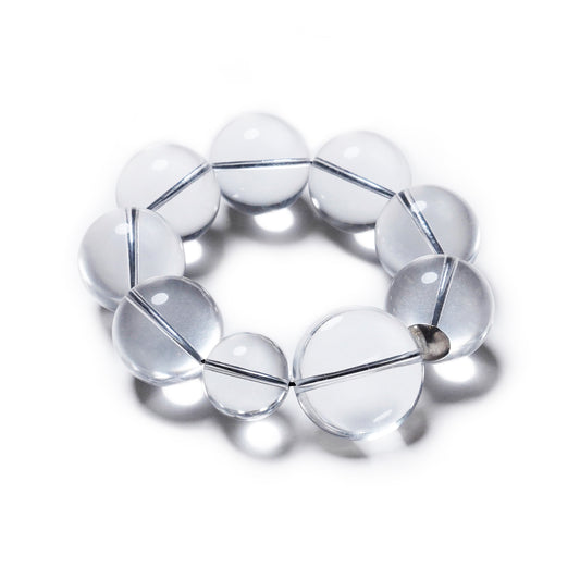 Pulsera transparente, elástica, liviana, cómoda, versátil y atemporal. Diseño conceptual latinoamericano. Escala ultra.