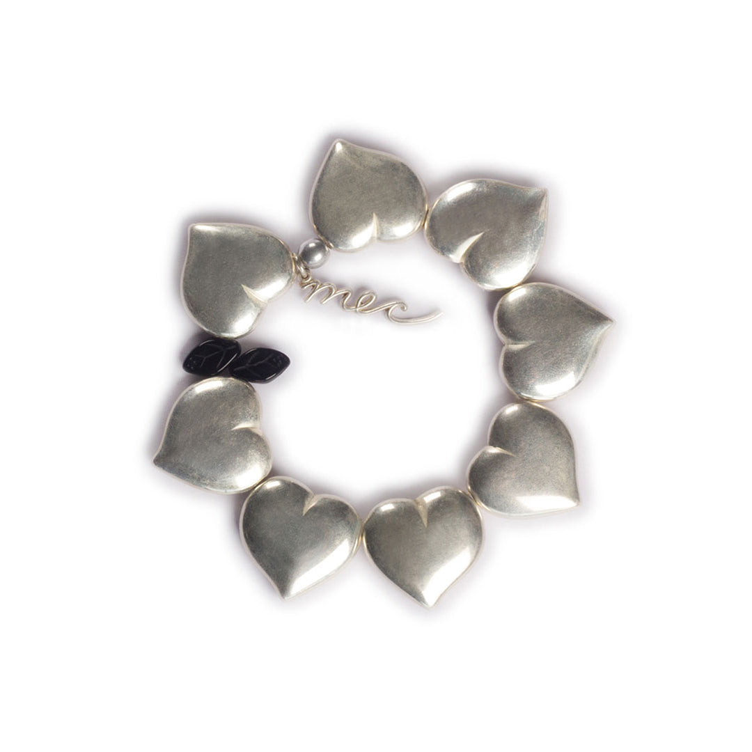 Pulsera elástica, dinámica, liviana, cómoda, versátil y atemporal. Diseño conceptual latinoamericano. Corazones escala ultra.