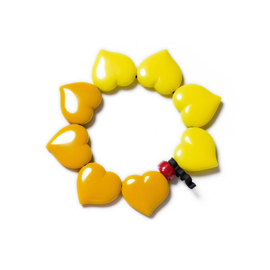 Pulsera multicolor elástica, dinámica, liviana, cómoda, versátil y atemporal. Diseño conceptual latinoamericano. Corazones escala ultra.