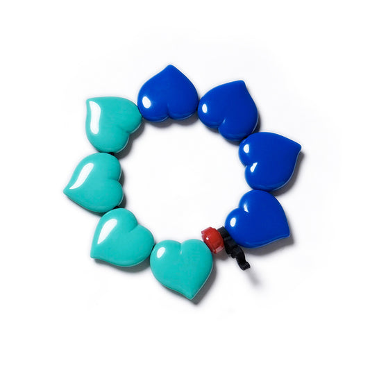Pulsera multicolor elástica, dinámica, liviana, cómoda, versátil y atemporal. Diseño conceptual latinoamericano. Corazones escala ultra.