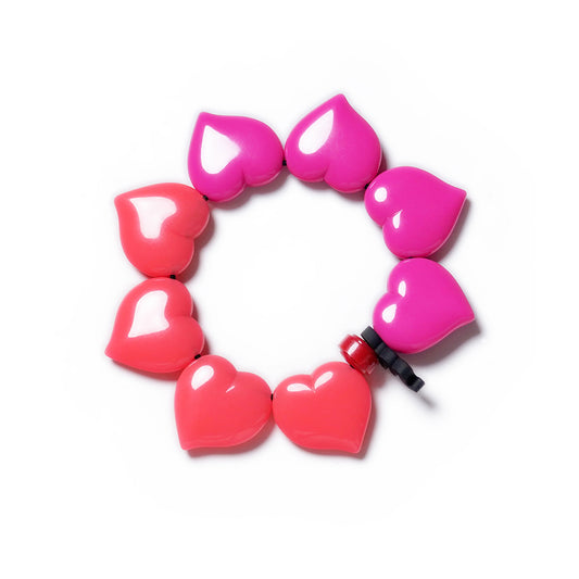 Pulsera multicolor elástica, dinámica, liviana, cómoda, versátil y atemporal. Diseño conceptual latinoamericano. Corazones escala ultra.