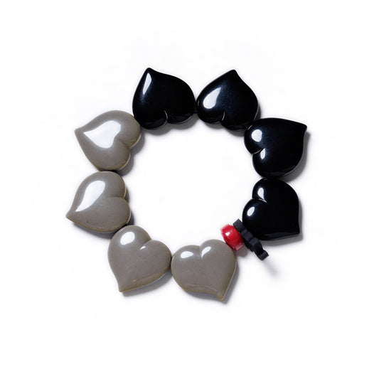 Pulsera multicolor elástica, dinámica, liviana, cómoda, versátil y atemporal. Diseño conceptual latinoamericano. Corazones escala ultra.