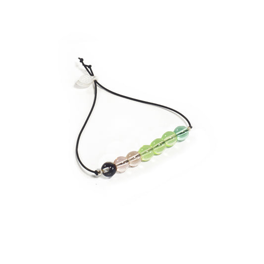 Pulsera multicolor elástica, liviana, cómoda, versátil y atemporal. Diseño conceptual latinoamericano. Escala micro.