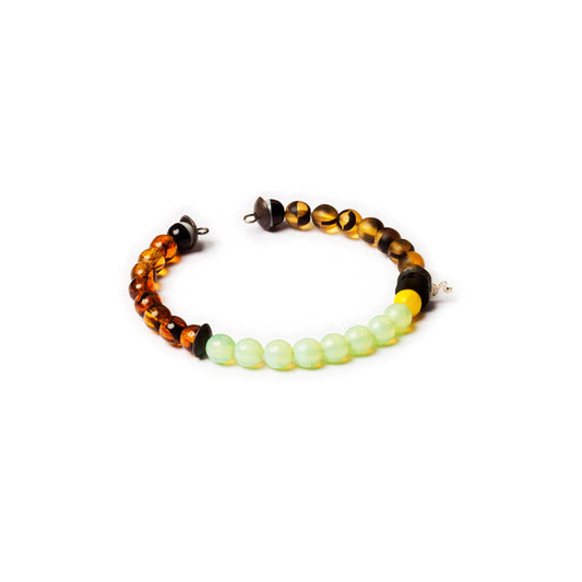 Pulsera flexible de cuentas variadas, con hilo memory. Diseño conceptual latinoamericano. Objetos de Edición Limitada. Escala micro.