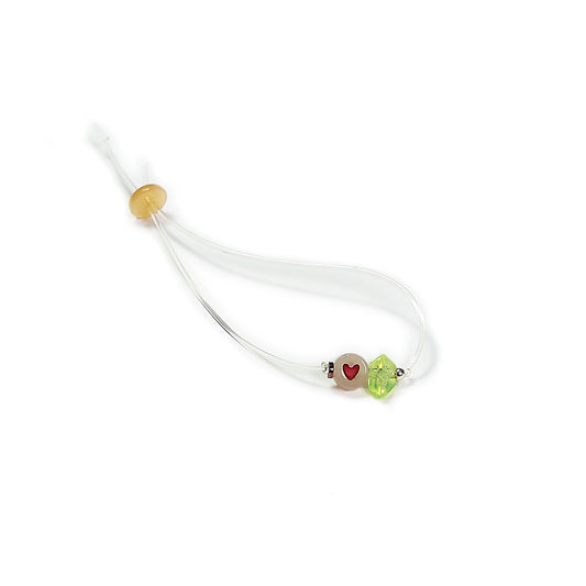 Pulsera multicolor elástica, ajustable, liviana, cómoda, versátil y atemporal. Diseño conceptual latinoamericano. Escala micro.