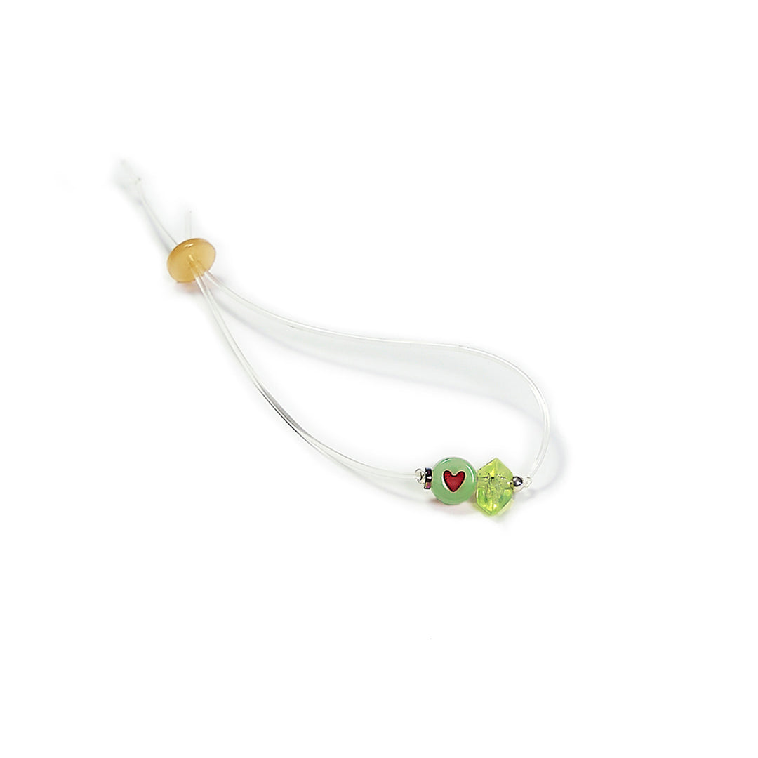 Pulsera multicolor elástica, ajustable, liviana, cómoda, versátil y atemporal. Diseño conceptual latinoamericano. Escala micro.