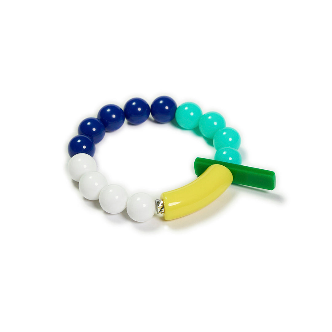 Pulsera multicolor elástica, liviana, cómoda, versátil y atemporal. Diseño conceptual latinoamericano. Escala macro.